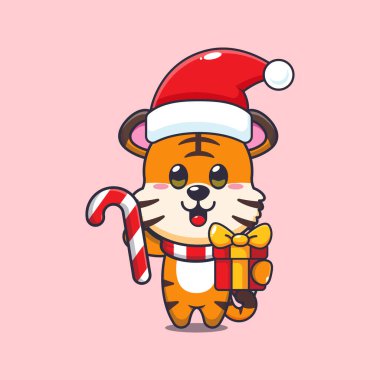 Noel şekeri ve hediye taşıyan sevimli kaplan. Sevimli noel çizgi film karakteri çizimi. 