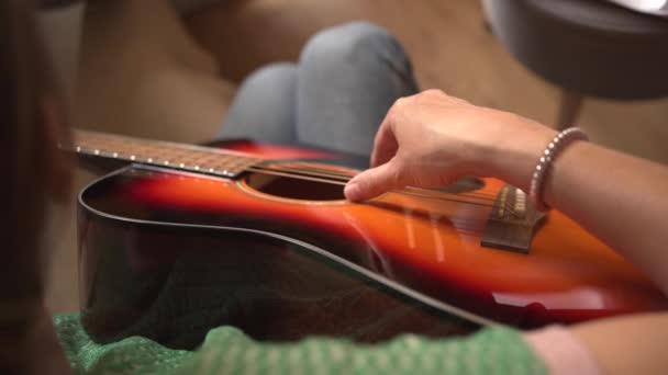 Detail Woman Practising Her Acoustic Guitar View Green Jumper — Stock Video