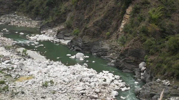Pebble-lined Beas river in India.