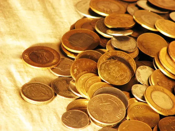 stock image Scattered Indian rupee coins.