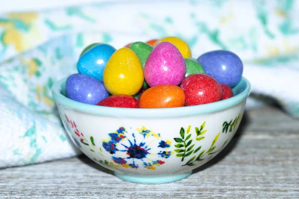 Bright Colorful Chocolate Easter Eggs Bowl Floral Pattern Wooden Table — Stock Photo, Image