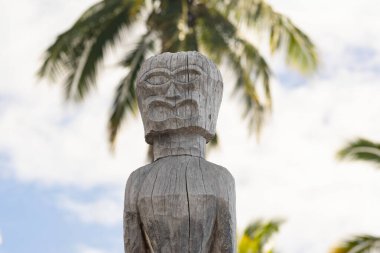 'Aumakua or family Hawaiian god represented in traditional form of wooden carved statue. Pu?uhonua o Honaunau national historical park, Hawaii, the USA. clipart