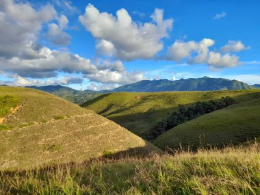 Beautiful nature mountain landscape with cloudy sky in summer.