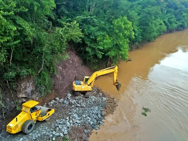 Construction of a road on the Mekong River in Luang Prabang, Laos