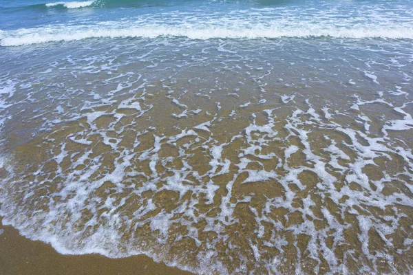 沙滩上海浪的柔软质感 — 图库照片