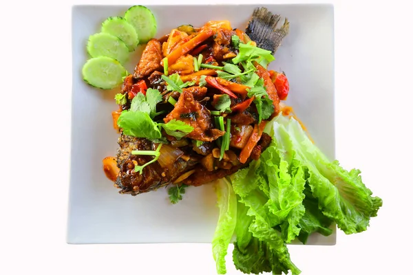 stock image Fried fish with sweet chili sauce on white plate, Thai food. White isolated background.