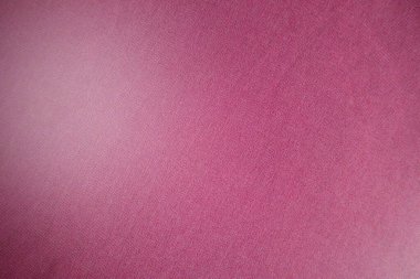 Metin veya resim için kopyalama alanı olan tasarım için pembe kumaş dokusu arkaplanı.