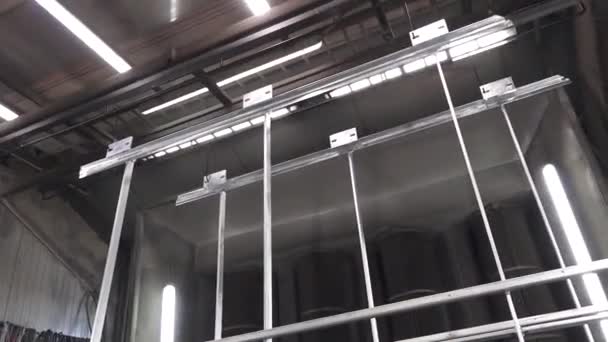 Metal Frames Suspended Factory Setting Powder Coating Painting Industrial Lights — Stock Video