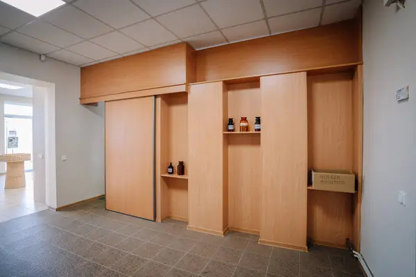 stock image Ilukste, Latvia - September 10, 2024 - Pharmacy shelf labeled displaying various vitamin and supplement products.