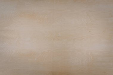 Açık renkli ahşap bir yüzeye yakın çekim, doğal tahıl ve düğümler, arka plan veya malzeme kullanımı için ahşaptaki dokuyu ve ince desenleri gösterir.