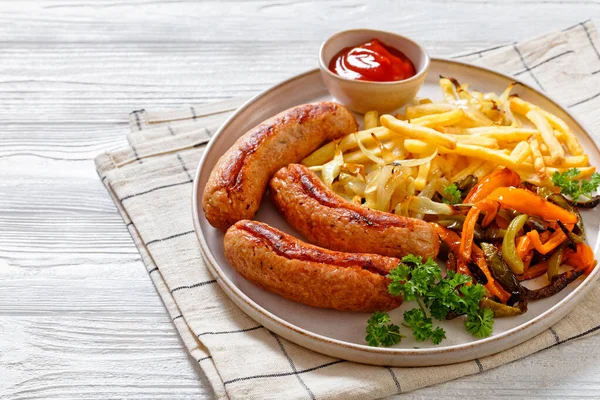 Grilled Sausages Sliced Green Orange Peppers Onion French Fries Plate — Stock Photo, Image
