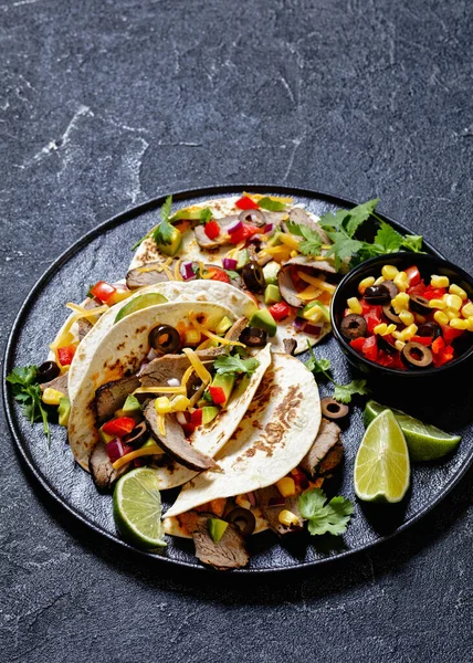 Grilled Steak Tacos Olives Tomatoes Red Onion Avocado Corn Shredded — Stock Photo, Image