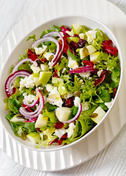 Close Green Salad Apples Goat Cheese Cranberries Red Onion Pepitas — Stock Photo, Image