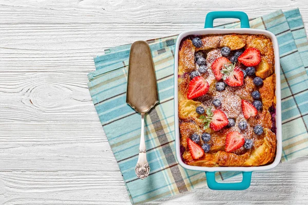 Sweet Croissant Breakfast Casserole Berries Blue Baking Dish White Wood — Stock Photo, Image