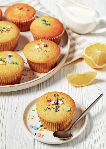 Close Sweet Lemon Muffins Topped Holiday Sprinkles White Plate White — Stock Photo, Image