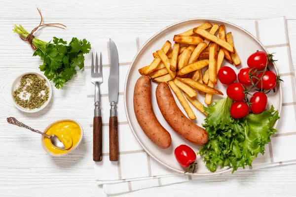 Italian Sausages French Fries Lettuce Fresh Tomatoes Mustard Plate White — Stock Photo, Image