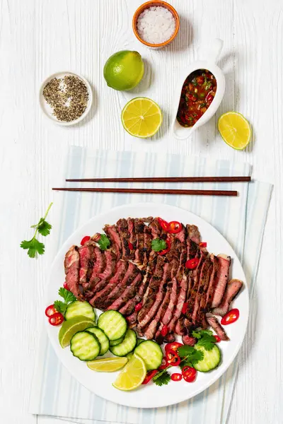 Crying Tiger Grilled Thinly Sliced Ribeye Steak Cucumber Lime Plate — Stock Photo, Image