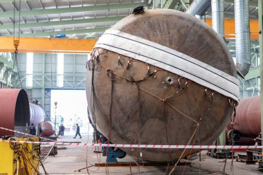 Post weld heat treatment to pressure vessel. It is a controlled process in which a material that has been welded is reheated to a temperature below its lower critical transformation temperature.