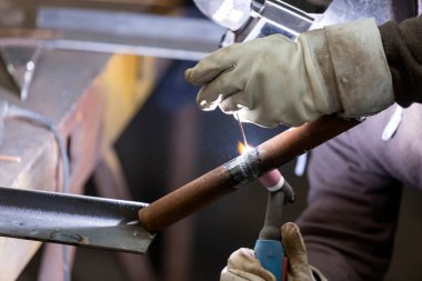 Welder qualification testing with gas tungsten arc welding (gtaw, argon) process of the stainless steel pipe. Welder certification is based on specially designed tests to determine a welder's skill.