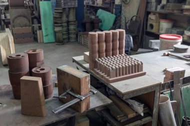 View of the sand mold casting. Sand casting, also known as sand molded casting, is a metal casting process characterized by using sand as the mold material.