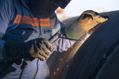 Shielded metal arc welding, manual metal arc weld, flux shielded arc weld or stick welding, is a manual arc welding process that uses a consumable electrode covered with a flux to lay the weld.