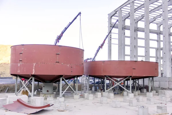 View of the construction site for flotation chemical plant. Froth flotation is a process for selectively separating hydrophobic materials from hydrophilic.