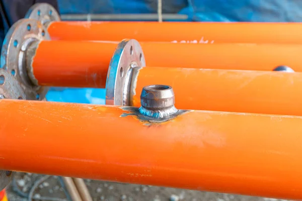View of the small-branch connection of the pipe with gas tungsten arc welding method. Weldolet is the kind of pipe fitting used to make a branch with the littler size of primary pipe.