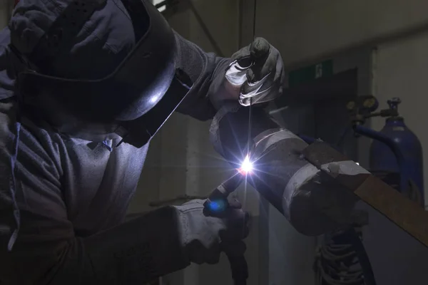 Welder qualification testing with gas tungsten arc welding (gtaw, argon) process of the stainless steel pipe. Welder certification is based on specially designed tests to determine a welder's skill.