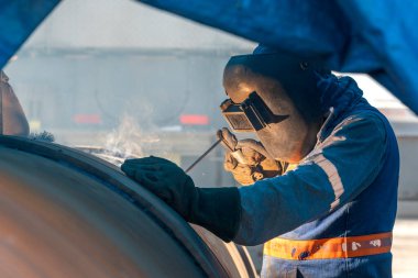 Shielded metal arc welding, manual metal arc weld, flux shielded arc weld or stick welding, is a manual arc welding process that uses a consumable electrode covered with a flux to lay the weld.