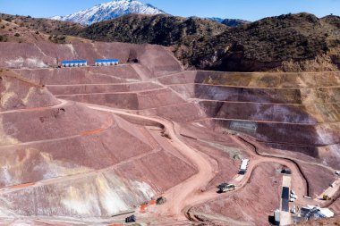 View of the industrial mine waste dam (tailing dam). A tailings dam is typically an earth-fill embankment dam used to store byproducts of mining operations after separating the ore from the gangue.
