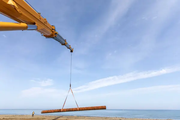 Crane Carrying Steel Piles Coast New Pier Installation Stock Image