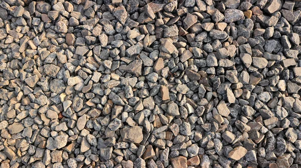 小さな道路石の背景 暗い砂利のテクスチャ 石の小石 シームレスなテクスチャ 鉄道砂利 — ストック写真
