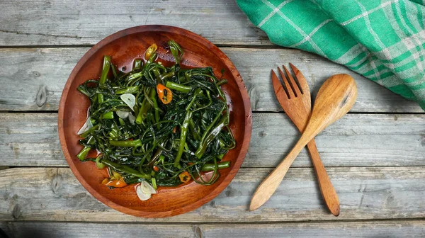 Stir fried water spinach or \