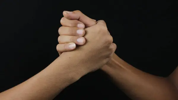 Two Hands of friends greeting each other