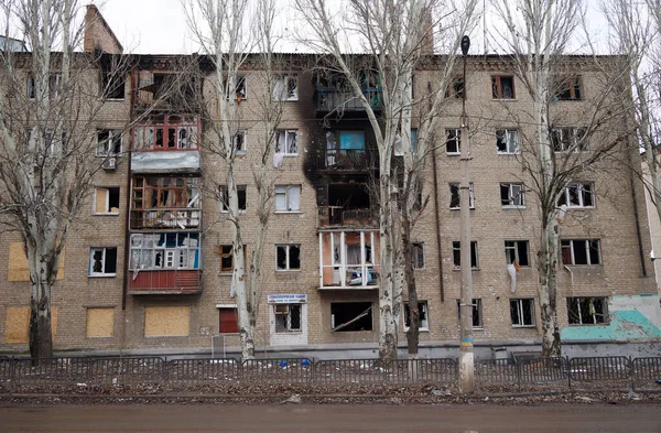 Bakhmut, UKRAINE JAN 19 2023 Damaged and destroyed by russian shelling and rocket attacks buildings on Bakhmut streets during russian invasion to Ukraine