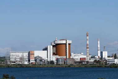 YUZHNOUKRAINSK, UKRAINE, - AUGUST 7 2023 Panoramic view of the South Ukraine Nuclear Power Plant clipart