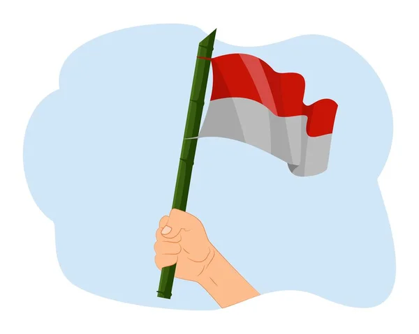 Handen Håller Indonesisk Flagga Vektor — Stock vektor