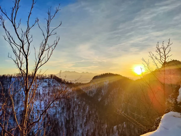 stock image February evening in Pieniny - Sokolica. The setting sun on the background of the Tatra Mountains