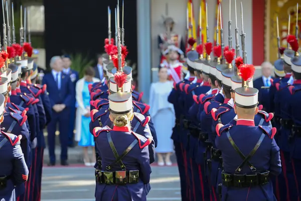 Stock image King's guards on parade. Some 4,100 military personnel participated during the National Day military parade including King Felipe VI, Queen Letizia, and Princess Leonor, in Madrid Spain.