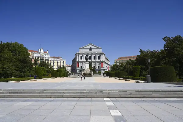 stock image A wide angle view of the the Royal Theatre, Opera, with a practically empty Plaza de Oriente in front of it during the middle of the afternoon in Madrid Spain.