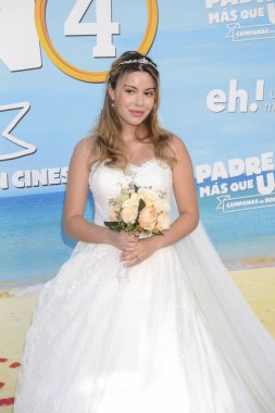 Martina D'Antiochia posing at the photocall during the media presentation of the Spanish comedy film, Father There Is Only One 4 - Padre no hay mas que uno 4 - at the Cine Callao Madrid Spain. clipart