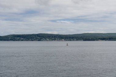 SOINTULA, CANADA - HAZİRAN 02, 2024: Vancouver Adası 'nın kuzeyi ile Malcolm Adası' nın kıyıları arasında dar yol