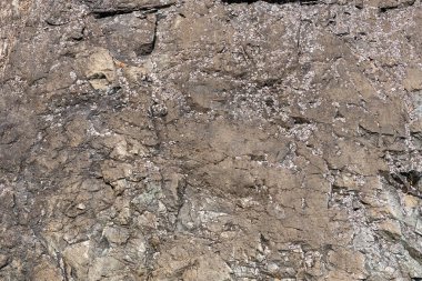 Kaya dokusu taş arka planda çatlaklar ve tasarım için kopyalama alanı