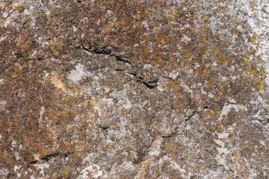 Kaya dokusu taş arka planda çatlaklar ve tasarım için kopyalama alanı