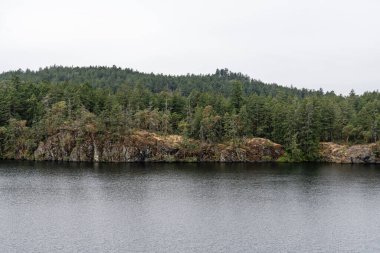 Thetis Gölü 'ndeki Thetis Gölü Bölgesel Parkı sakin su ve bulutlu gün
