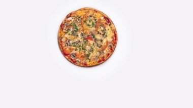 Hands taking slices of pizza from a wooden serving plate isolated on white background, top view. Stop motion design, animation of moving pizza pieces. Pizzeria advertising concept. Copy space, 4K.