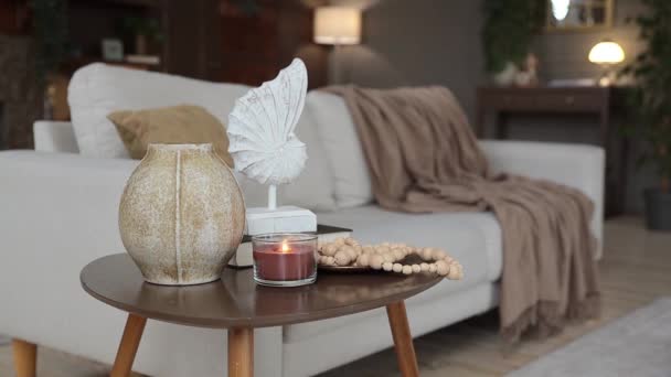 Coffee Table Stylish Wooden Decor Handmade Vase Burning Candle Blurred — kuvapankkivideo