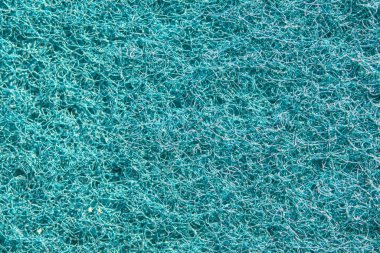 Mavi iplik kumaş dokusu. Süngerin üstündeki kumaş. Tasarım için arkaplan ve doku.