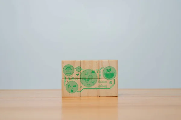 Long-term, climate-neutral strategy,   wooden cubes with carbon emission reduction and green icon, Low carbon, carbon neutral concept,green banne.
