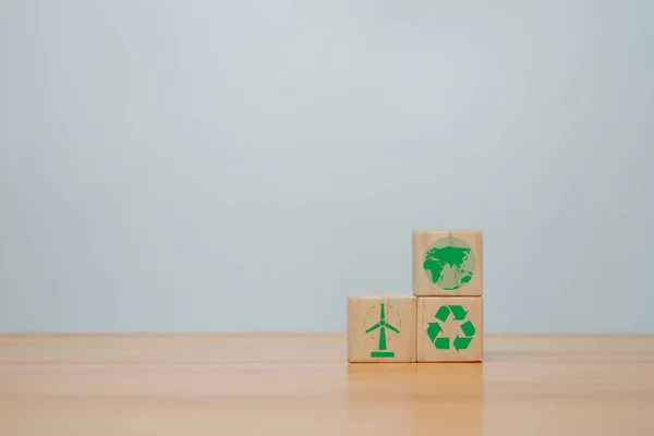 Long-term, climate-neutral strategy,   wooden cubes with carbon emission reduction and green icon, Low carbon, carbon neutral concept,green banne.